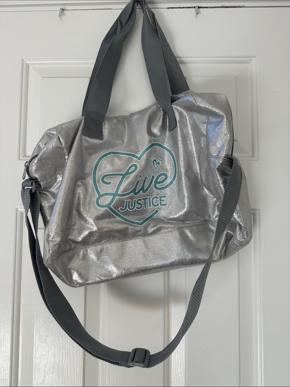 Justice Silver Metallic Tote with Teal 'Live' Heart Logo